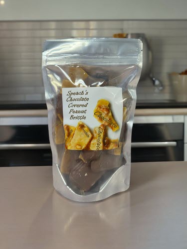 Chocolate Covered Peanut Brittle bag on kitchen countertop